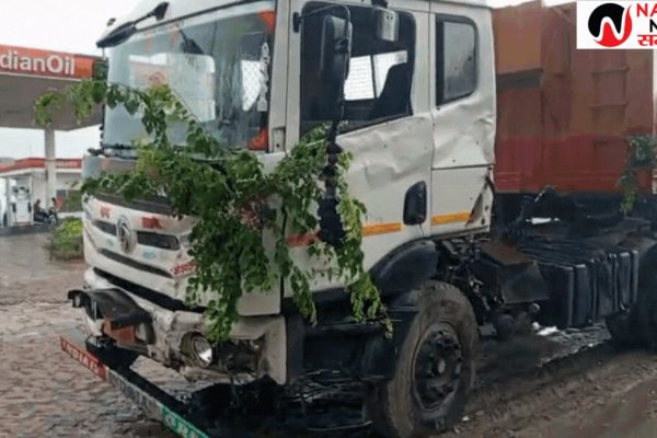 Three people including the tractor driver were injured in a head-on collision between a trailer and a tractor